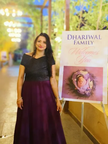 Standing beside the welcome sign at a baby naming ceremony I planned and hosted in Pune. The elegant decor and personalized touches helped create a warm and welcoming atmosphere for this special family occasion.