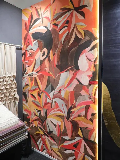 A vibrant, artistic mural featuring abstract faces intertwined with autumn leaves. This 'Wall & Deco' design is a bold, expressive piece that turns a wall into a contemporary art installation.