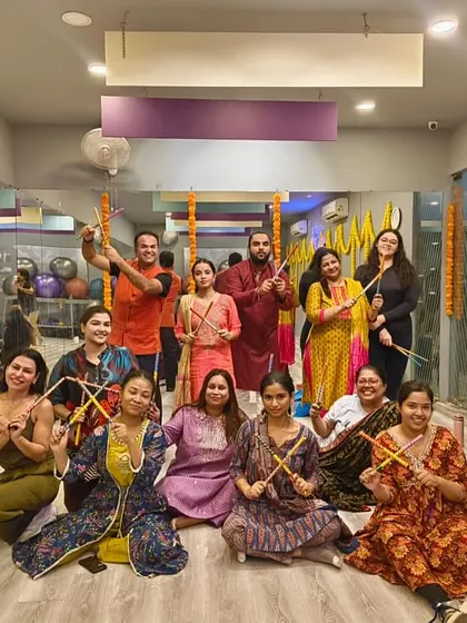 Another group photo from our Dandiya celebration. The studio is decorated, and the members are all smiles, showcasing the festive community spirit.