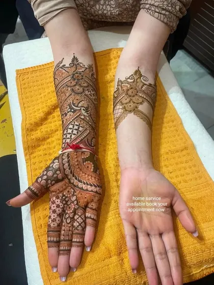 A half-and-half design, showing the intricate work on one hand.