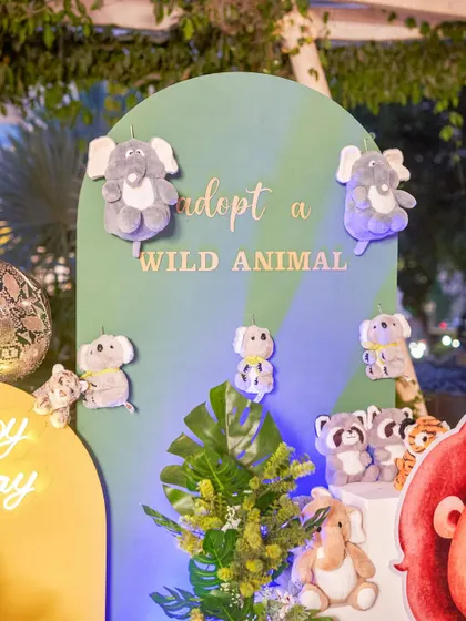 An "Adopt a Wild Animal" station is a wonderful party favor idea for a jungle theme. It's an interactive and memorable takeaway for the little guests.