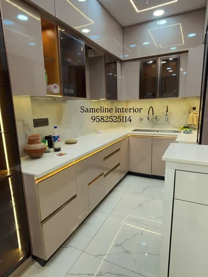 Another angle of the kitchen, showing the seamless integration of handleless drawers and cabinets, creating a clean and streamlined look.