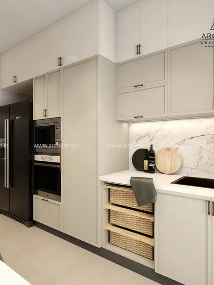 Another angle of the shaker-style kitchen, highlighting the integrated appliance unit and pull-out wicker baskets. The design is a perfect blend of classic aesthetics and modern convenience.