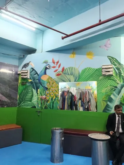 This part of the jungle mural features a beautifully detailed peacock. We take care to capture the unique beauty of each animal and plant in our nature scenes.