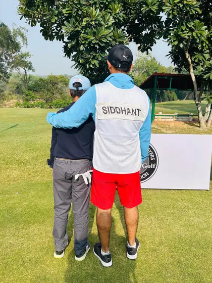 On the bag for my student, Siddhant. Being a caddie for my players in tournaments gives me invaluable insight into their game and mental process.