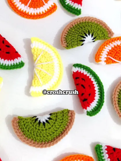 A bulk order of my fruit slice keychains, featuring watermelon, kiwi, orange, and lemon designs.