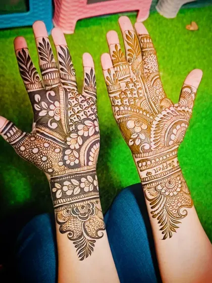 A unique design where one hand features bold, negative-space florals while the other has more traditional patterns.