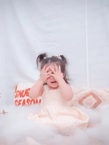 Peek-a-boo! The toddler years are full of personality, play, and endless curiosity. Our sessions are designed to let your little one's character shine through naturally.