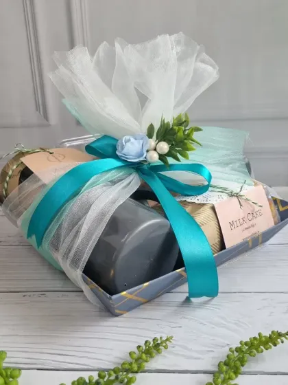 A great connection deserves a great gift. This corporate hamper, wrapped in cool blue and white, is another example of how we customize our gifts to match your brand's needs.