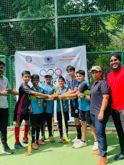 Our junior boys' team celebrates their victory at the Olympic Day Event. We are proud to see our young players competing and winning with such enthusiasm.