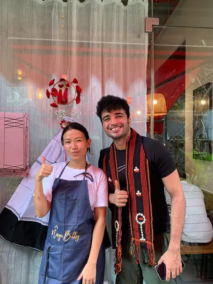 One of our founders with a guest wearing a traditional Naga scarf. Sharing our culture and seeing our guests appreciate it means the world to us.