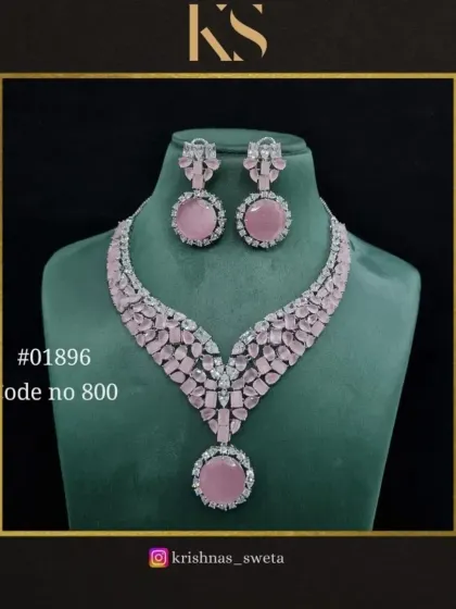 The same American Diamond set, available in a delicate baby pink. This is a perfect choice for a softer, more romantic look.