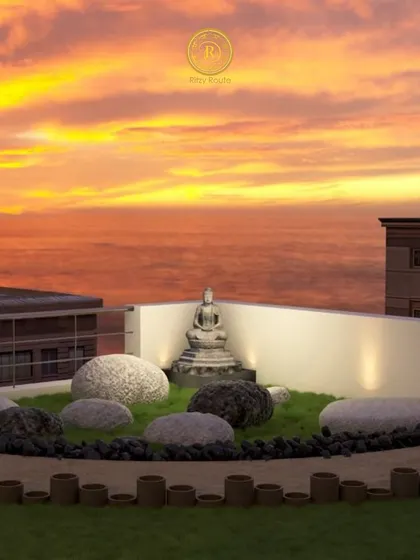 Another view of the serene Zen garden on a terrace, set against a beautiful sunset, creating a perfect space for meditation and peace.