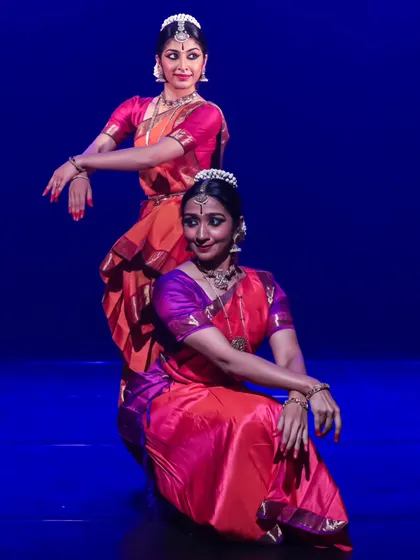 This pose from a duet showcases the use of different levels and complementary postures. I design my choreography to be visually dynamic, using the entire stage space.