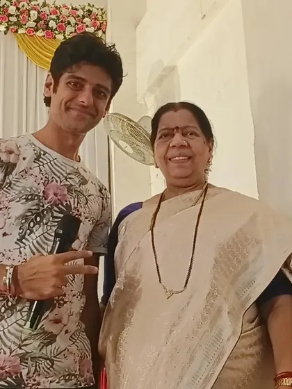 A picture with Mhanda Taai Mhatre, MLA of Belapur, after hosting her brother's wedding anniversary. I have the experience and professionalism to host events for political figures and other VIPs.