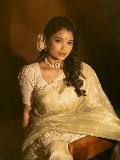 A collection of images from a retro-themed photoshoot with the beautiful actress Sanjana Tiwari. I created a soft, classic hairstyle with side-swept curls and floral accents to match the vintage aesthetic.