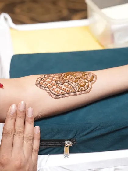A simple and elegant arm band design, showing that even small mehendi can be very beautiful.