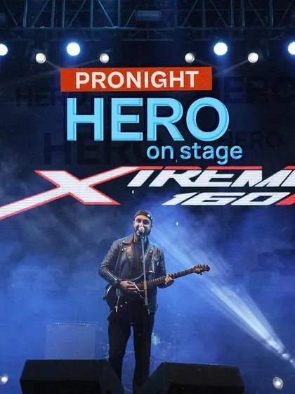 Hero on stage. For this event, we integrated the brand directly into the Pronight, complementing their on-ground stunt shows and test drives.
