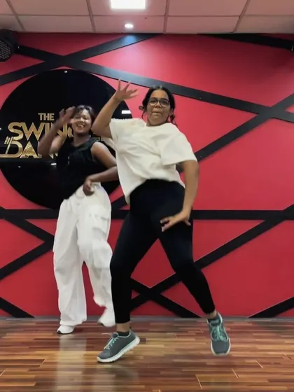 A teacher and student showcase where our faculty grooves alongside their students. This image captures the fun and supportive relationship we foster in our classes.