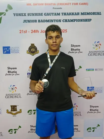 Vikrant Singh Negi with his trophy after winning the Boys' Doubles U15 title at the prestigious Gautam Thakkar Memorial Tournament.