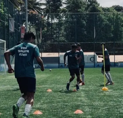 A player focuses on a cone drill, designed to improve agility and close-control dribbling. We hammer the technical fundamentals relentlessly.