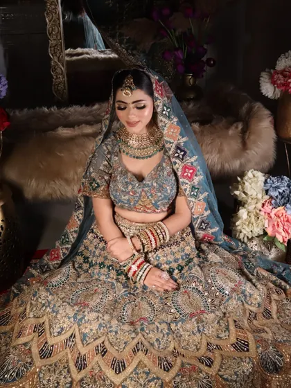 Another beautiful seated portrait that shows the full bridal look in all its glory.