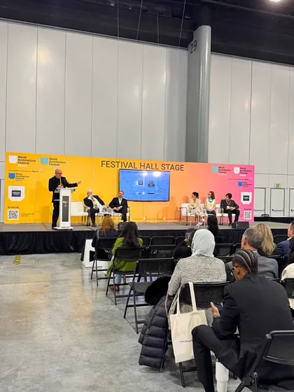 A view of the Festival Hall Stage during a panel discussion at WAF. These sessions bring together diverse perspectives on the future of design, and I am there to document and share them.