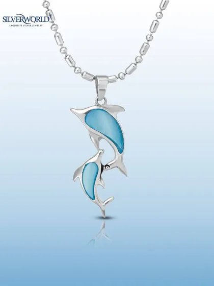 This dolphin pendant, featuring blue inlay, evokes the spirit of the ocean. It's a graceful and serene design, perfect for those who love marine-inspired jewelry.