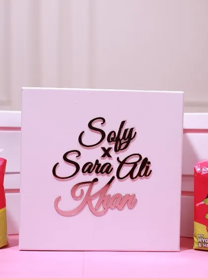 A special collaboration box for Sofy and Sara Ali Khan. The custom acrylic lettering on the box adds a premium, three-dimensional feel to the packaging.