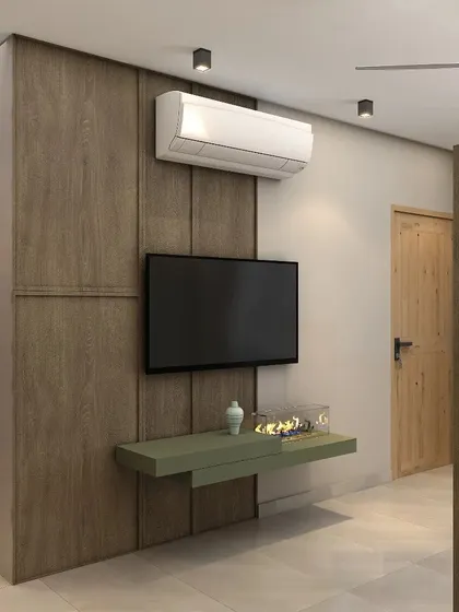 The modern TV panel is mounted on a rustic brown veneer wall, perfectly integrating contemporary style with natural textures.