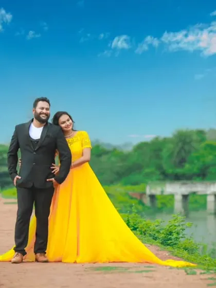 A classic couple's pose by the water, elevated by the vibrant yellow trail gown. I provided both his and her outfits for this coordinated pre-wedding look.
