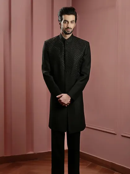 The complete look. Our black beaded Indo-Western jacket paired with matching trousers for a sharp, contemporary ethnic outfit.
