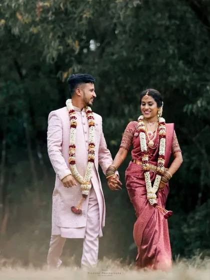 A candid shot of the couple walking hand-in-hand after their ceremony. These in-between moments are often the most memorable from a wedding day.