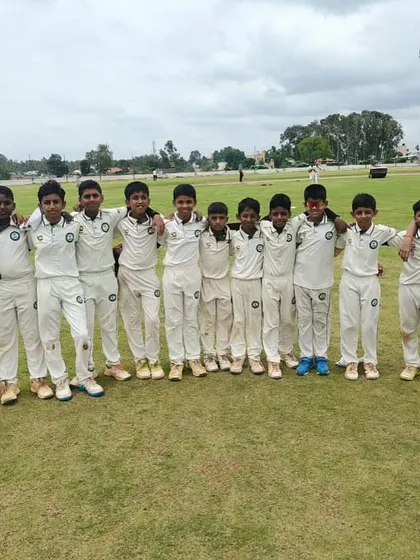 Our U-12 team stands together on the field.
