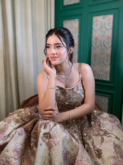 A full-length view of the magnificent sequined gown, perfect for a reception or cocktail event.
