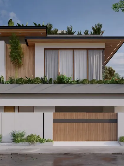 Another view of the weekend home, showing the clean, minimalist lines of the compound wall and gate, which complement the modern architecture of the house.