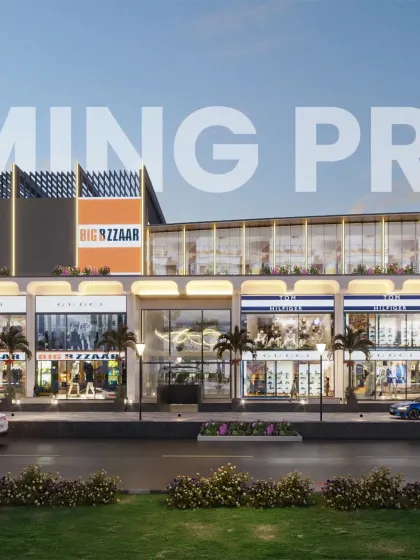 An elevation of the TDI Mall project, showcasing the brand-ready storefronts and illuminated vertical fins designed to attract and inspire.