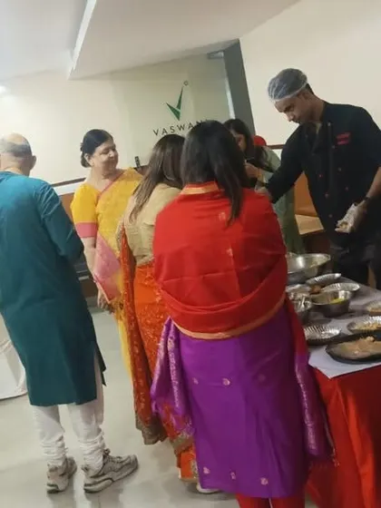 Guests gather around our live counter, eagerly waiting for freshly prepared snacks. It's a focal point of fun and food at any event.