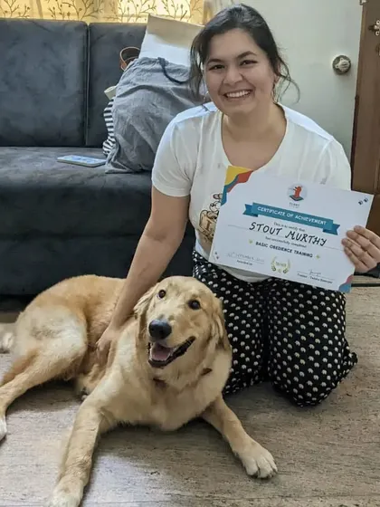 Here I am with Stout, my very first Bangalore student to complete his puppy training program. I am so proud of the progress he and his family have made together.