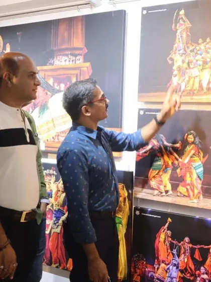 Dr. Ravindra Singhal explaining the story behind one of his stunning cultural photographs to me.