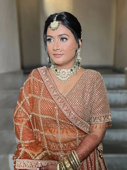 Another angle of this beautiful bridal look, showing how the makeup looks from different perspectives. The contour is soft and the glow is consistent.