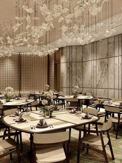Another perspective of the Ceejay Residency banquet hall, showcasing the beautiful interplay of light and texture. The design uses curved walls and a soft color palette to create a warm and inviting atmosphere.
