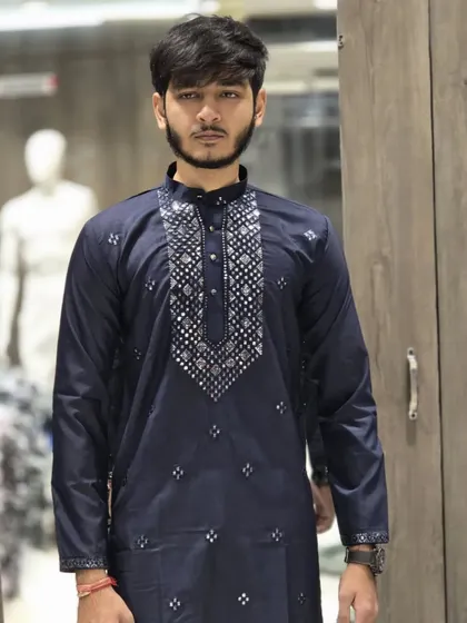 The navy blue version of the ready-to-wear mirror-work kurta.