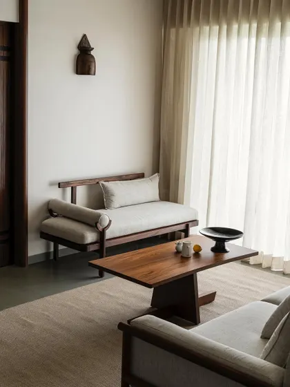 The living room of Apartment 1005 is an exercise in restraint and elegance. We designed custom teak wood furniture with clean lines and paired it with a neutral color palette to create a calm, zen-like atmosphere.