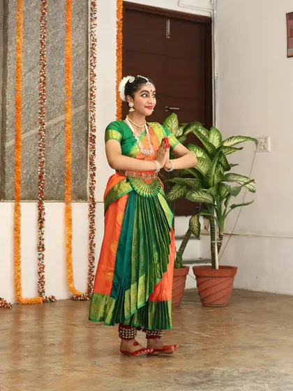 A young dancer greets the audience at the Platform Performances event.