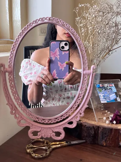 Another view of the custom butterfly phone case, styled on my desk. The pink and purple color scheme is one of my favorites to work with.