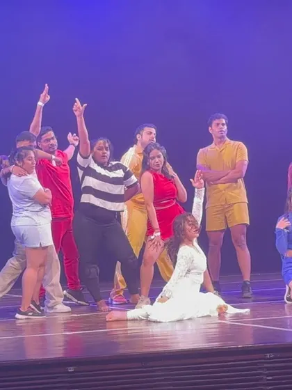 A dynamic pose from one of the group numbers at Manch 24, showing the diverse range of students who participate. Manch is open to everyone who wants to experience the thrill of a live performance.