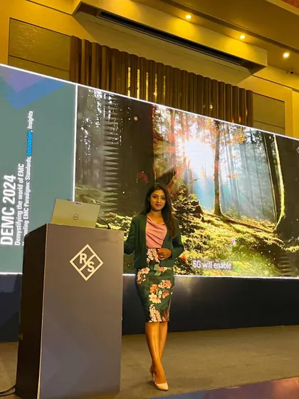 At the podium for the Rohde & Schwarz DEMC 2024 conference. I am experienced in managing technical presentations and ensuring the program runs on schedule.