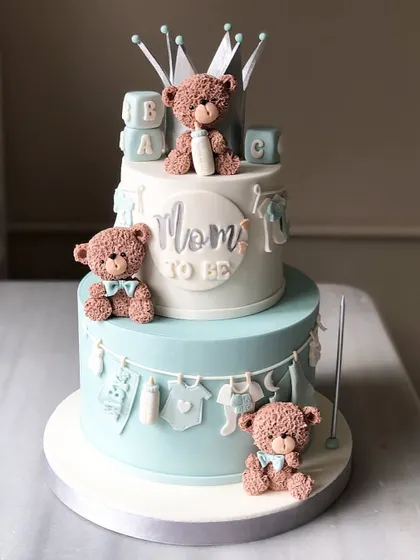 Another view of the adorable blue and white baby shower cake.