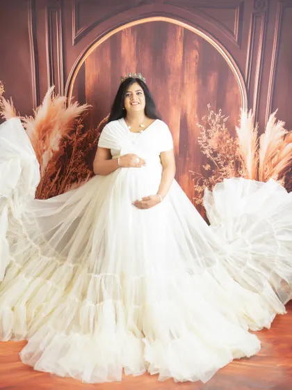 A truly dreamy portrait in a magnificent white cloud gown. This dress creates a stunning, ethereal effect, perfect for a fantasy-themed shoot.
